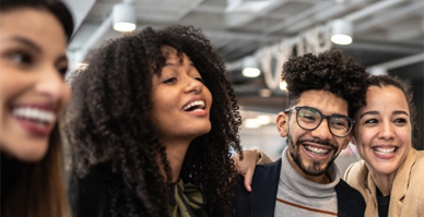 Diverse group of people laughing and smiling